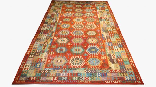 “Handmade multicolored geometric pattern Kilim rug with traditional motifs”