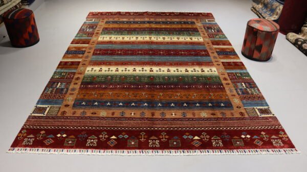 Stock #AR-2319 – Size: 304 x 208 CM (9.9 x 6.8 FT) Vibrant multicolored traditional design featuring rich reds, earthy tones, and intricate patterns.
