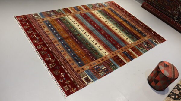 Stock #AR-2319 – Size: 304 x 208 CM (9.9 x 6.8 FT) Vibrant multicolored traditional design featuring rich reds, earthy tones, and intricate patterns. - Image 6