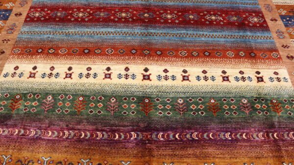 Stock #AR-2319 – Size: 304 x 208 CM (9.9 x 6.8 FT) Vibrant multicolored traditional design featuring rich reds, earthy tones, and intricate patterns. - Image 3