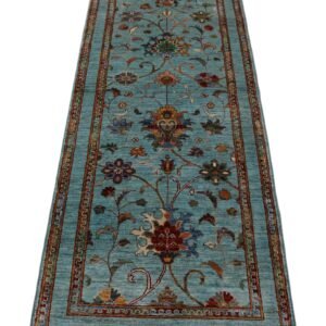 Beautiful floral Afghan rug with vibrant colors in a traditional design.